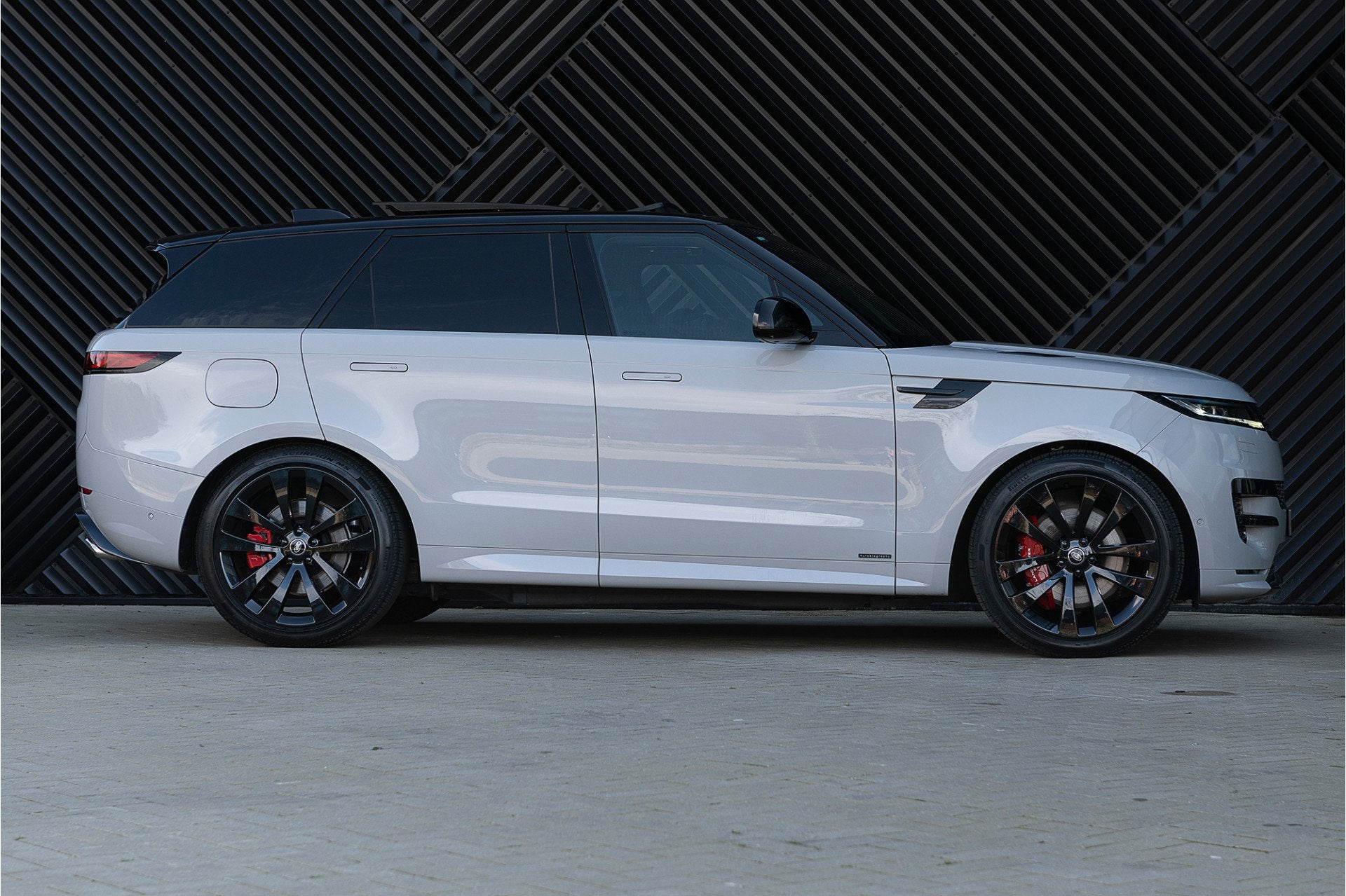 Land Rover Range Rover Sport P550e Autobiography ACC Pano 36, Auto's, Automaat, Gebruikt, Zwart, Lichtsensor
