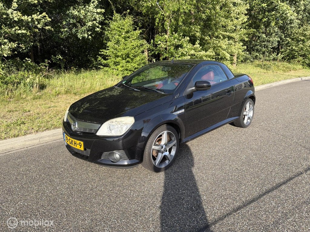 Opel Tigra TwinTop 1.4-16V Linea Nera, Auto's, Opel, Gebruikt, 4 cilinders, Cabriolet, 1389 cc