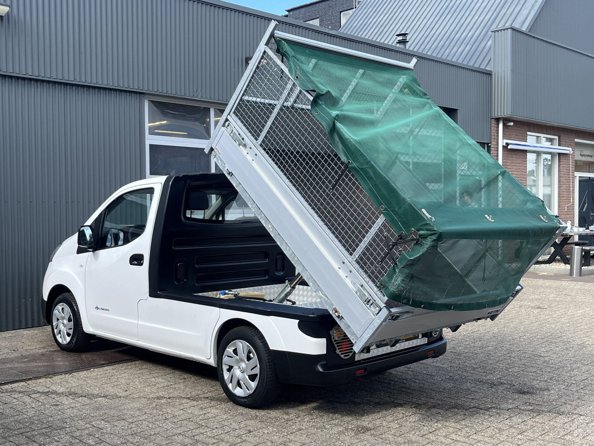 Nissan E-NV200 Elektrische Kipper Openlaadbak Airco Cruise c, Stof, Gebruikt, Zwart, Automatische klimaatregeling