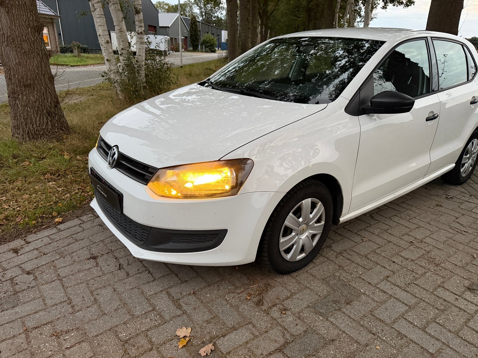 Volkswagen Polo 1.2 2011 5 DRS Stoelverwarming/Carplay, Auto's, Voorwielaandrijving, Zwart, 1199 cc, Wit