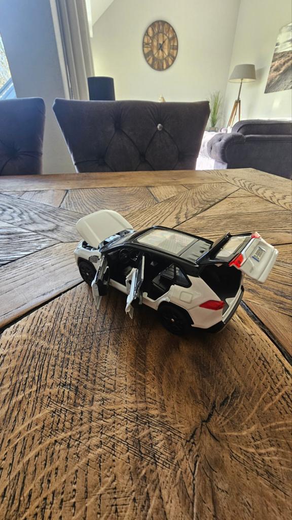 Toyota RAV4 Hybride parelmoer wit bitone Modelauto 1:32, Ophalen of Verzenden, Nieuw, Auto, Overige merken