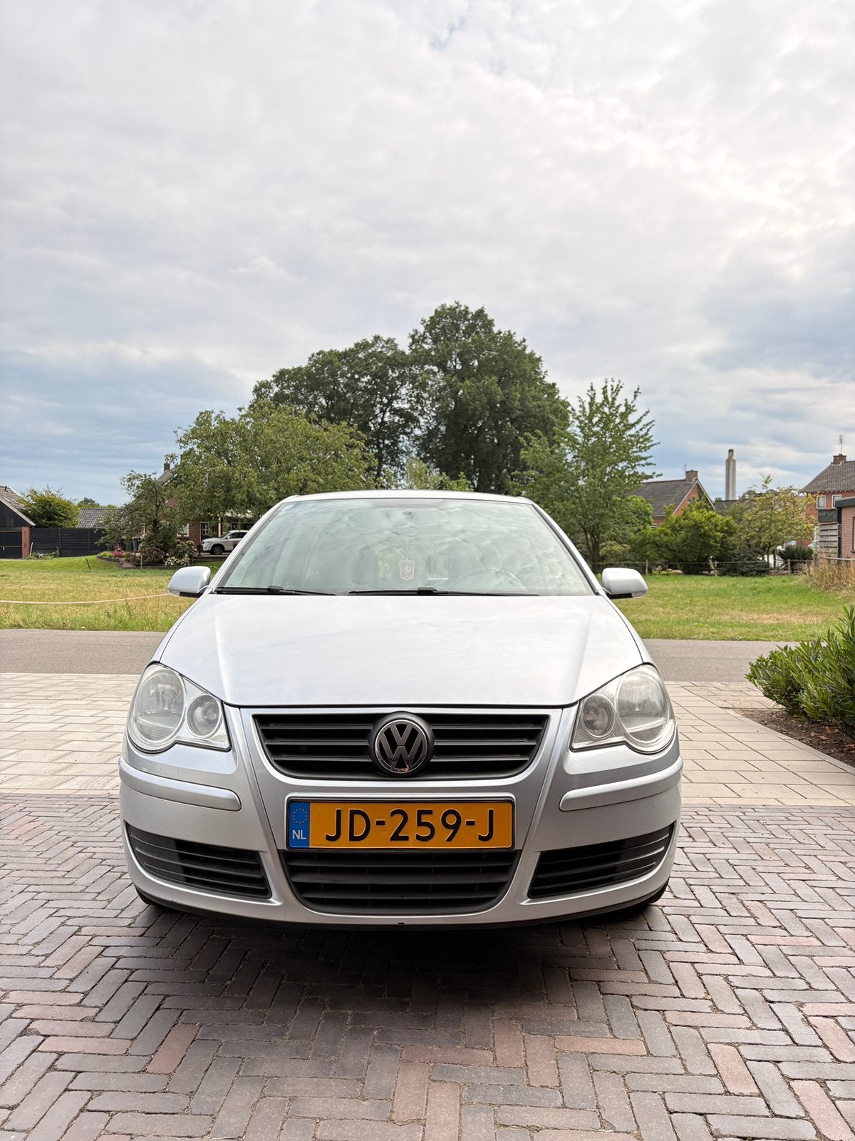 Volkswagen Polo 1.2 51KW 2009 Grijs (met lichte schade), Auto's, Volkswagen, Voorwielaandrijving, 40 €/maand, 540 kg, 1198 cc