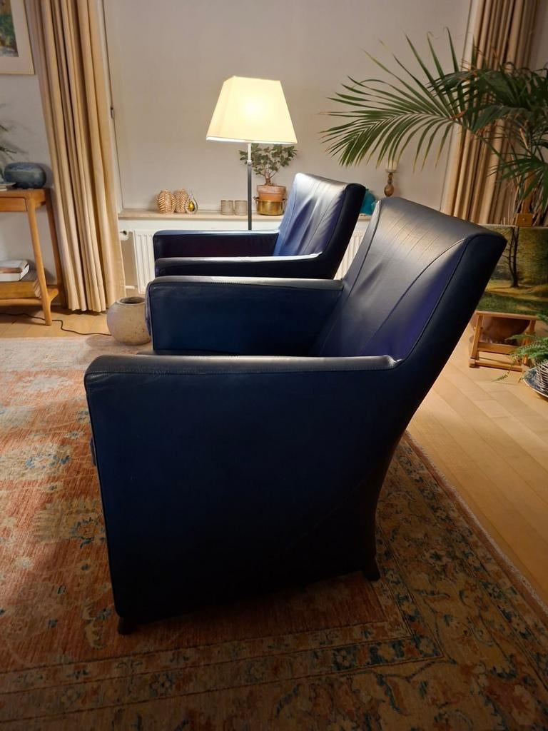 Twee donkerblauwe Wittman fauteuils met voetenbank, Ophalen of Verzenden