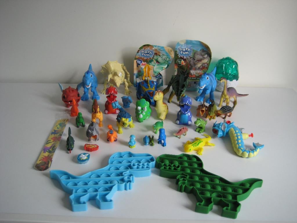 Heel veel dino's! poppetjes pop-it klaparmband Transformers, Ophalen of Verzenden, Zo goed als nieuw