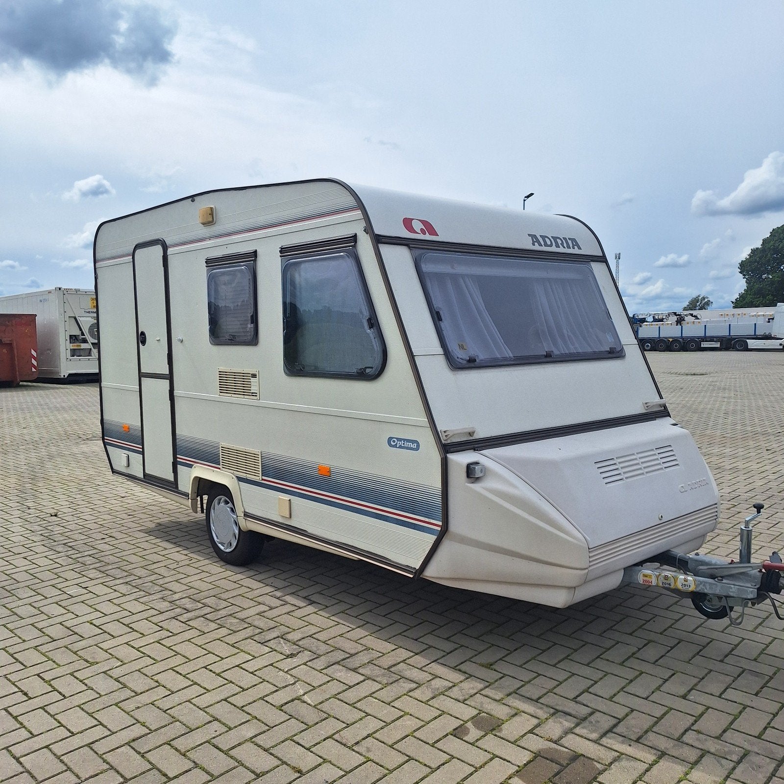 Adria Optima 427, Voortent+luifel+erker, Stapelbed, Fietsrek, Bedrijf, Treinzit, Dwarsbed, Adria