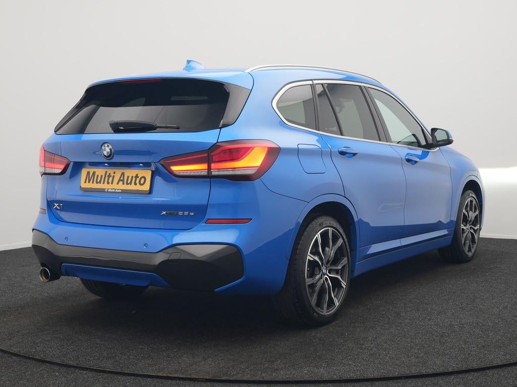 BMW X1 xDrive25e M Sport PHEV 221pk Dealer O.H. | Camera | S, Gebruikt, Lichtsensor, Blauw, Leder en Stof