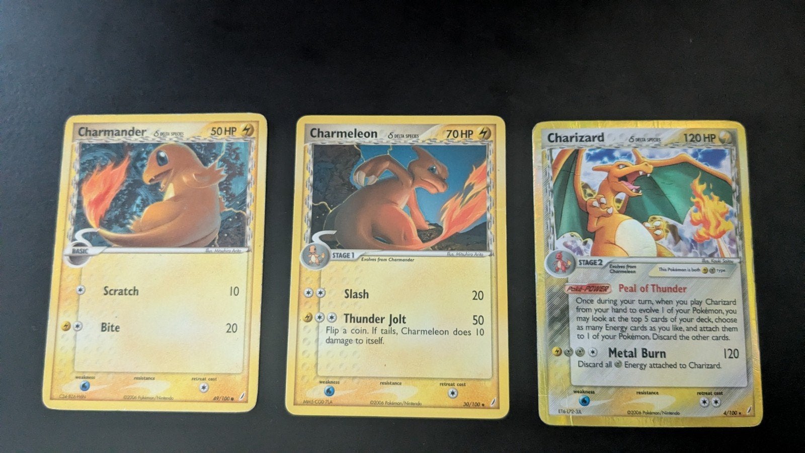 Pokémon Charizard 4/100 Delta Species Holo set, Ophalen of Verzenden, Gebruikt, Losse kaart