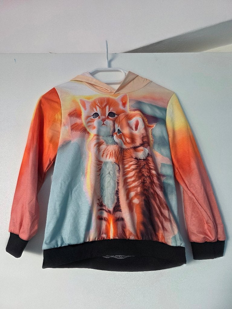 Nieuw meisjes trui maat 122/128 oranje met katten, Ophalen of Verzenden, Nieuw, Jongen