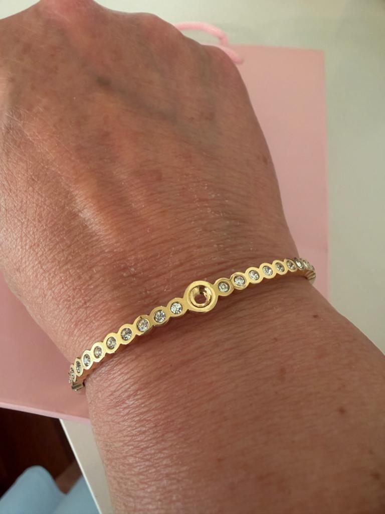 Melano Twisted Armband Goudkleurig met Zirkonia Steentjes, Met kristal, Overige materialen, Nieuw, Ophalen of Verzenden