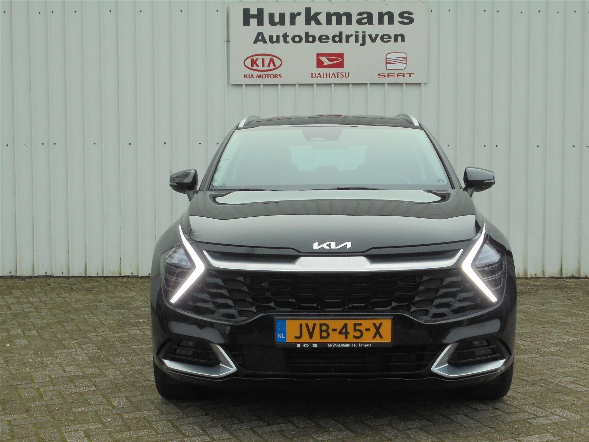 Kia Sportage 1.6 T-GDi 265PK PHEV LEER AWD ZEER COMPLEET, Automaat, Gebruikt, 4 cilinders, Zwart