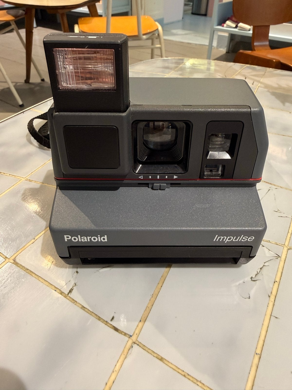 Polaroid Impulse Instant Camera (1984-1999) met flits, Ophalen of Verzenden, Zo goed als nieuw, Polaroid