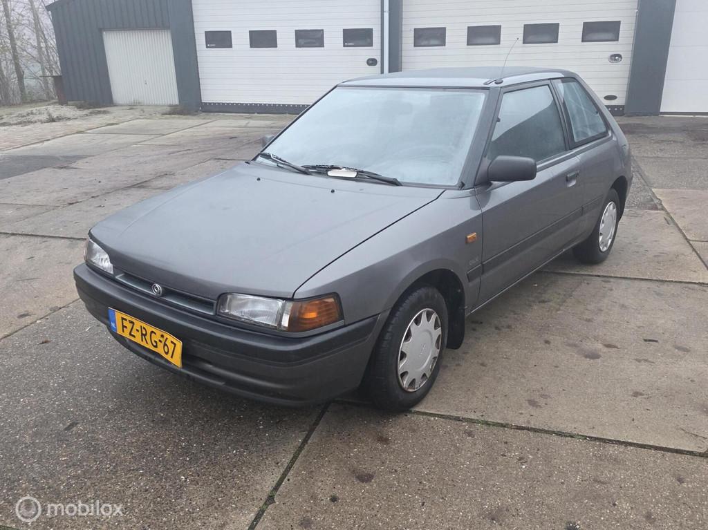 Mazda 323 1.6i GLX Automaat - oldtimer, Auto's, Mazda, Bedrijf, Te koop, Radio, Benzine, Euro 1, Hatchback, Automaat, Origineel Nederlands