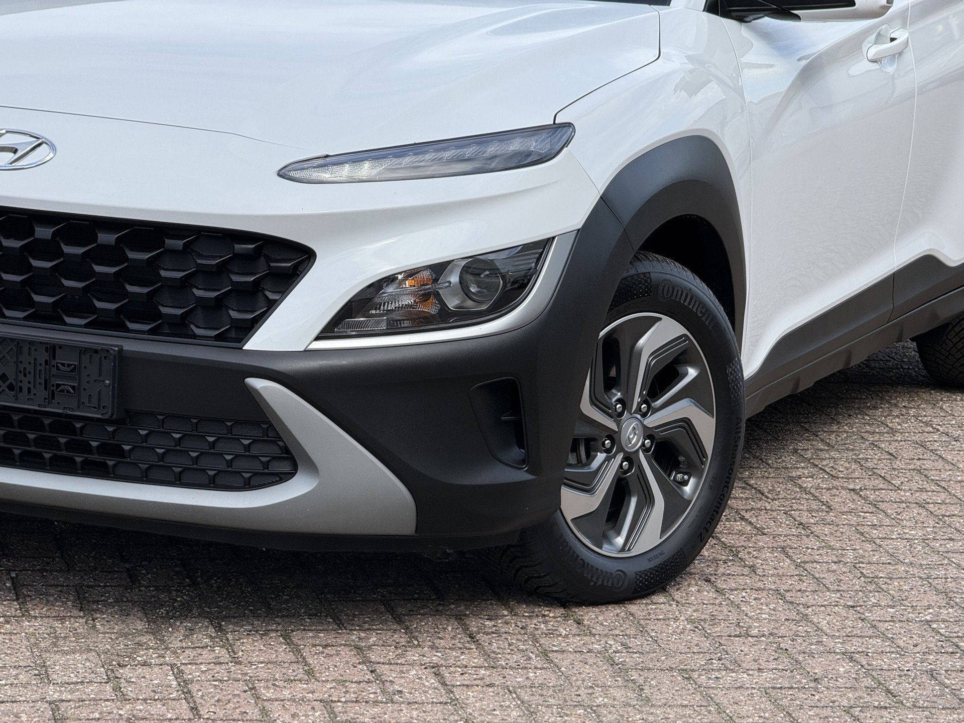 Hyundai KONA 1.6 GDI HEV Comfort (bj 2022, automaat), Auto's, Gebruikt, Wit, Bedrijf, Hybride Elektrisch/Benzine