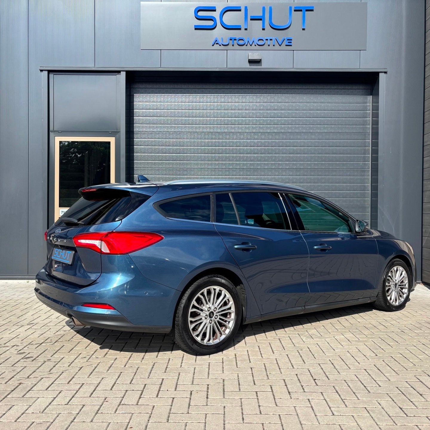 Ford Focus Wagon 125pk Titanium Business FULL LED | CARPLAY, Auto's, Dealer onderhouden, Gebruikt, Zwart, Blauw