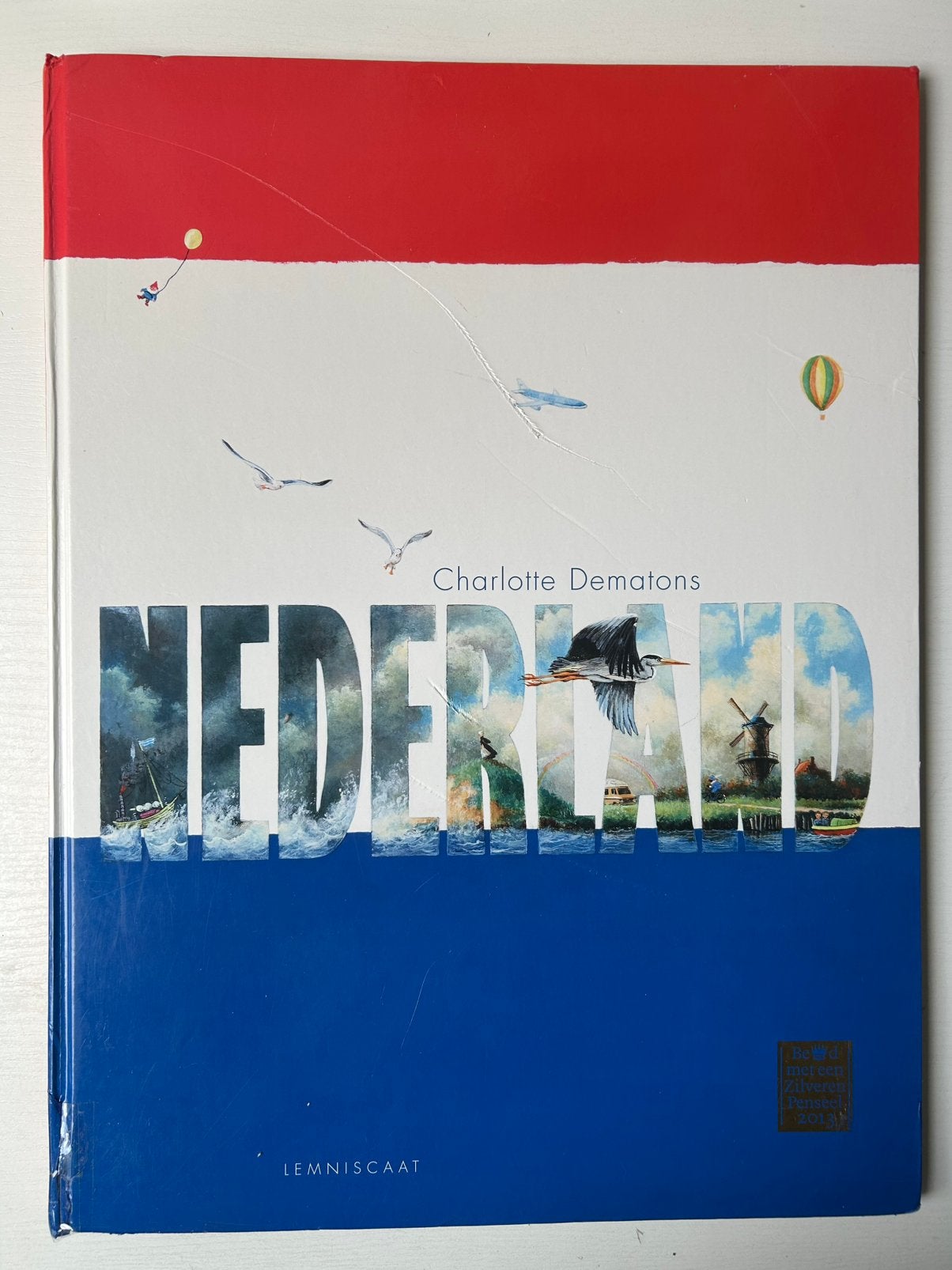 Charlotte Dematons Nederland Maxi 53 x 40 zilveren penseel, Boeken, Prentenboeken en Plaatjesalbums, Ophalen of Verzenden, Gelezen