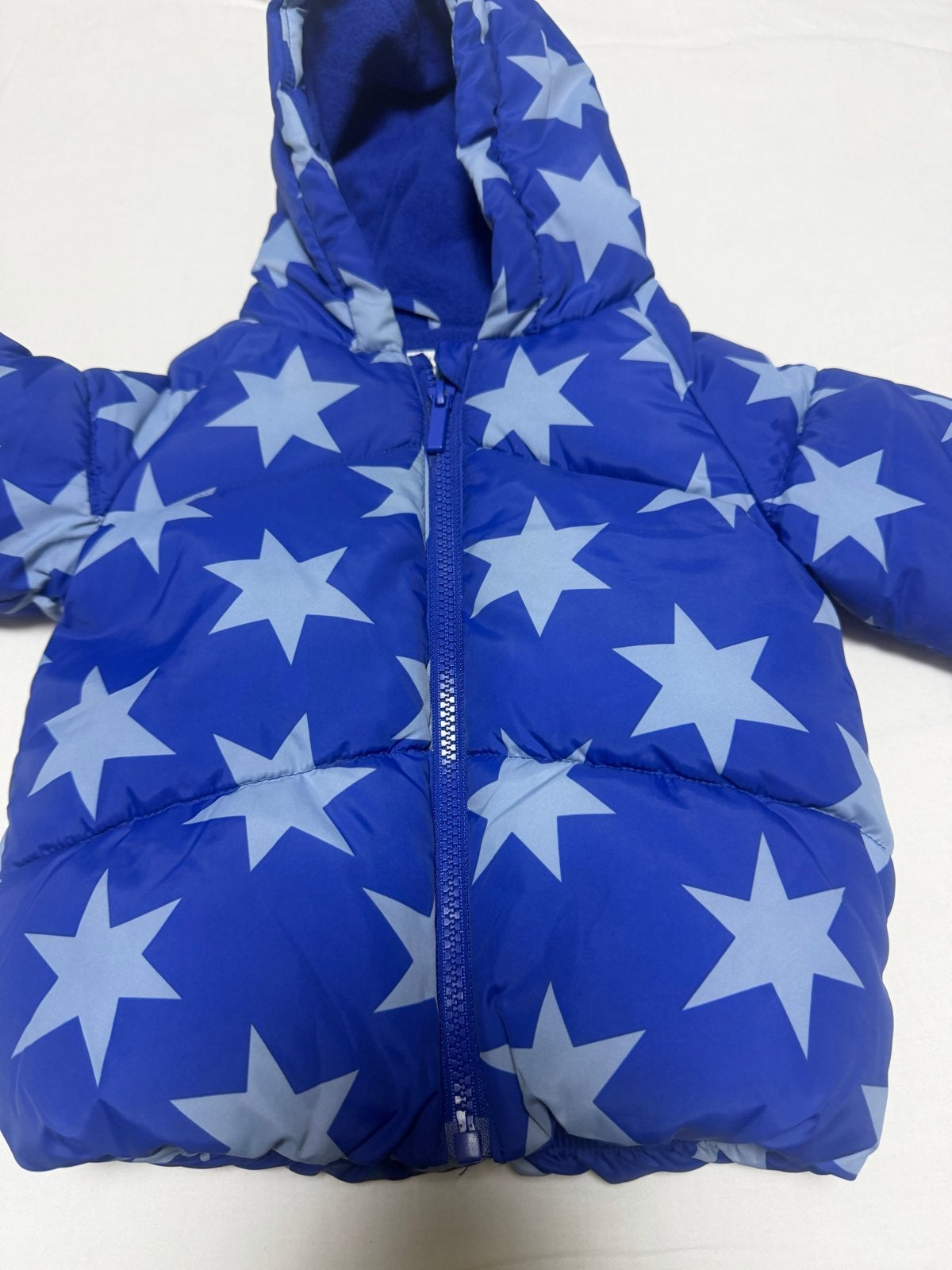 2x Primark baby winterjassen: sterren en auto's, Ophalen of Verzenden, Zo goed als nieuw, Jongen of Meisje