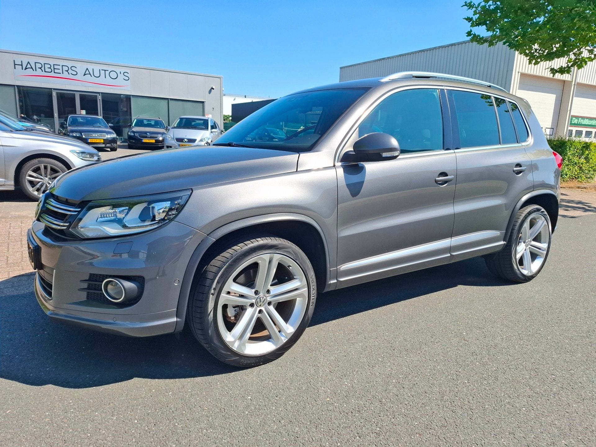 Volkswagen Tiguan 1.4 TSI R-line Edition PANO/XENON/NAVI/CAM, Auto's, Voorwielaandrijving, Euro 5, 15 km/l, Zwart