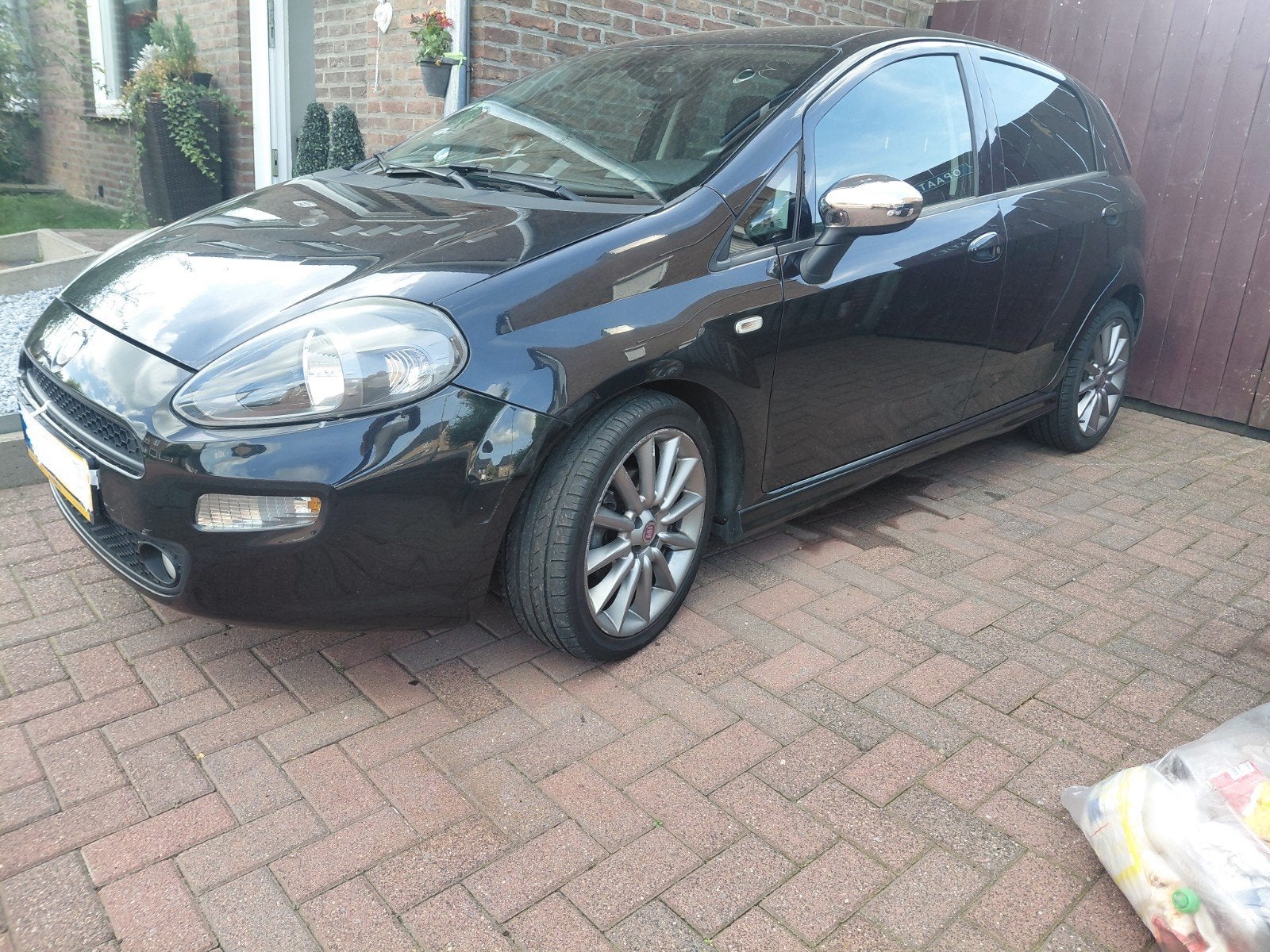 Fiat Punto evo  2012 Zwart, Auto's, Voorwielaandrijving, Origineel Nederlands, 24 km/l, Handgeschakeld