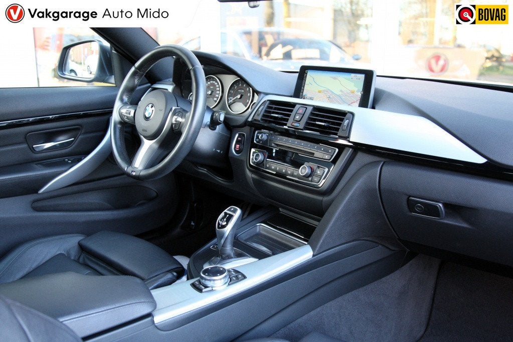 BMW 4 Serie Coupé 420i Automaat High Executive M-sportpakke, Auto's, BMW, 12 maanden, Gebruikt, 4 stoelen, 184 pk