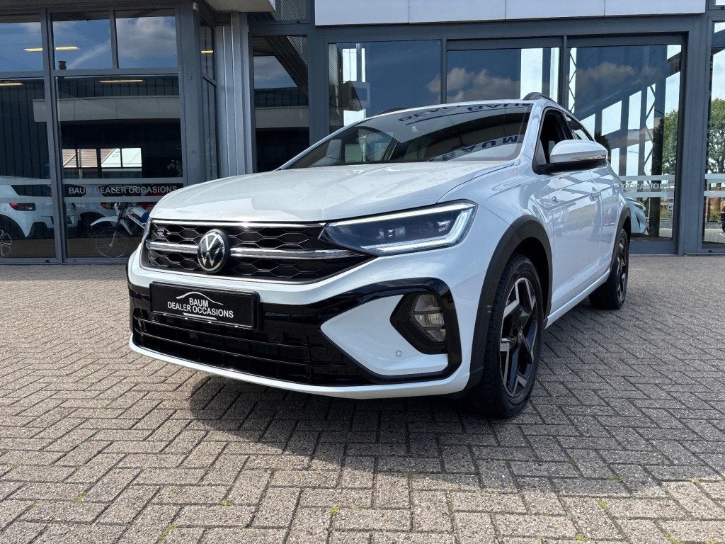 Volkswagen TAIGO 1.0 TSI R-LINE AIRCO NAVI CARPLAY PDC STOEL, Auto's, Volkswagen, Gebruikt, Huisgarantie, Met garantie (alle)