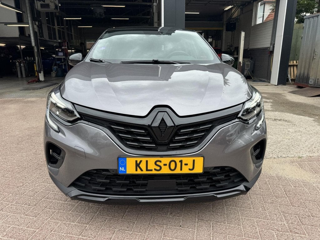 Renault Captur 1.6 E-Tech plug-in hybrid 160 SL Rive Gauche, Auto's, Renault, Gebruikt, Leder en Stof, Plug-in hybride, Bedrijf