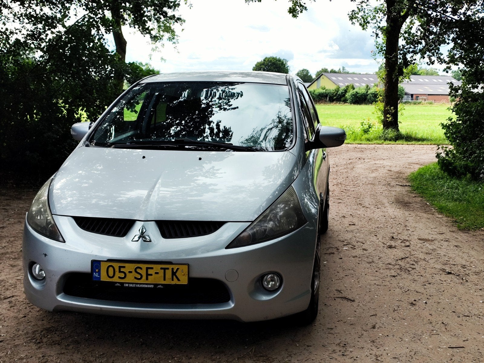 Mitsubishi Grandis 2.4 Mivec 7 AUT 2005 Grijs, Auto's, Mitsubishi, Stof, Zwart, 7 stoelen, 570 kg