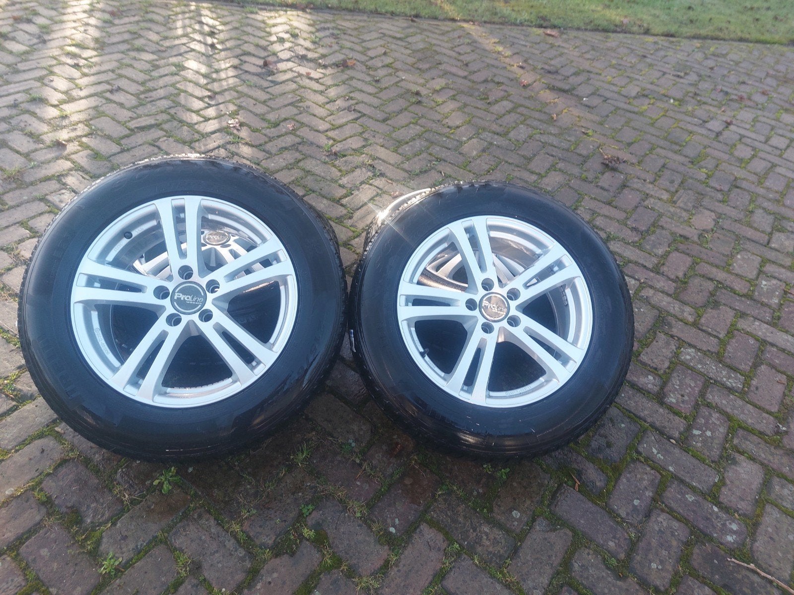 Pirelli Winterbanden met Proline Velgen 215/6, Ophalen