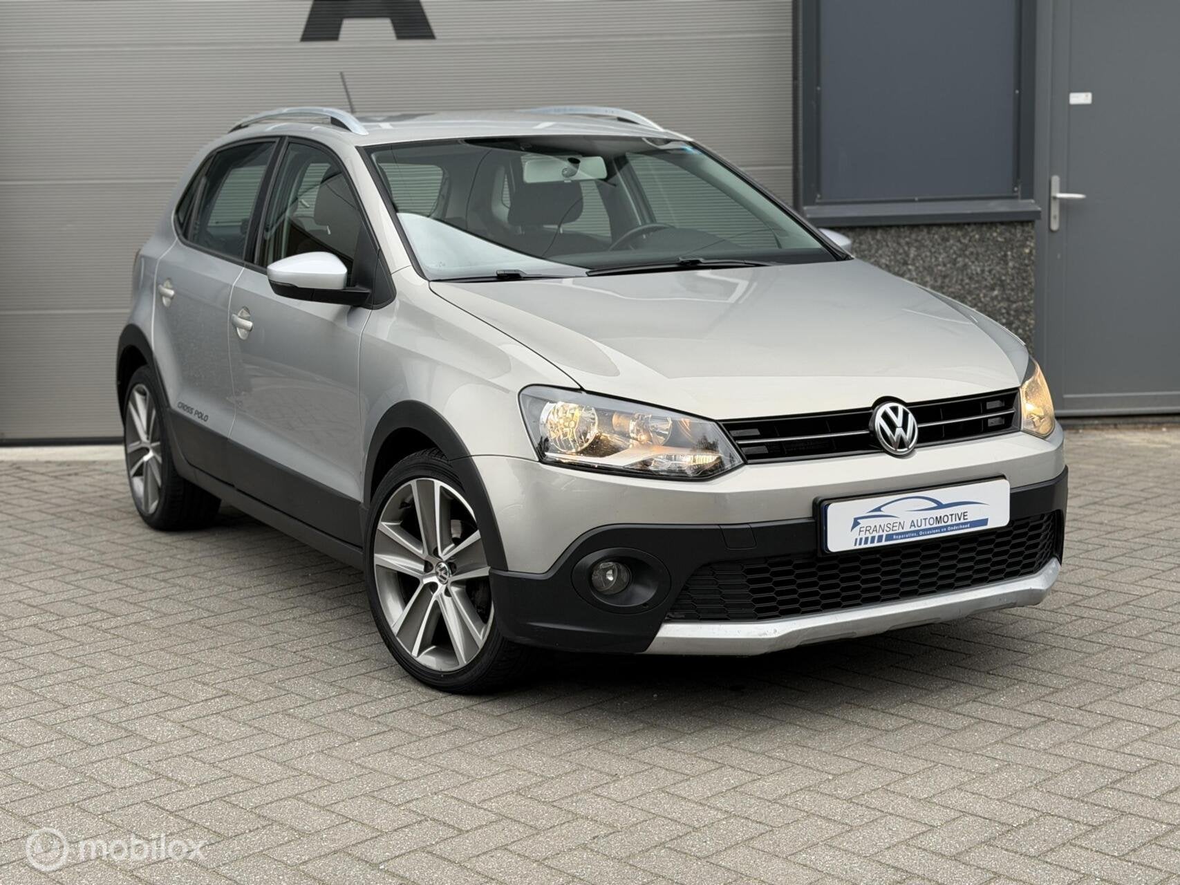 Volkswagen Polo 1.2 TSI Cross Clima/Cruise/Camera, Voorwielaandrijving, Euro 5, Stof, Zwart