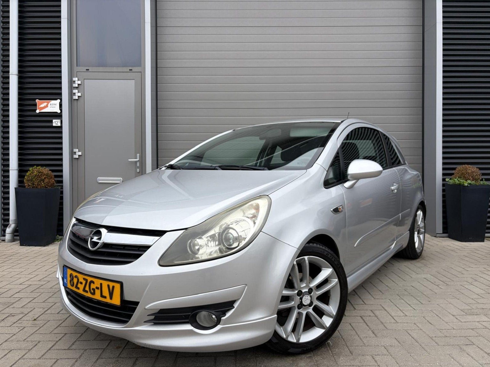 Opel Corsa 1.4-16V Sport/OPC uitvoering/Airco/Cruise control, Auto's, Voorwielaandrijving, Stof, Gebruikt, Zwart