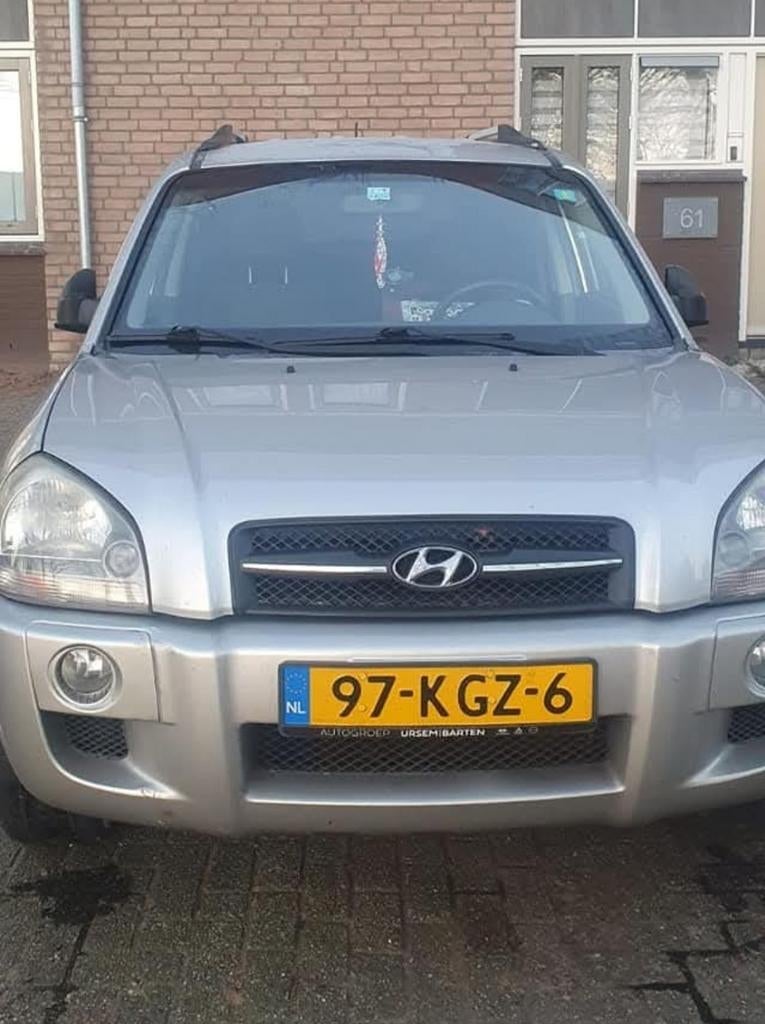 Hyundai Tucson 2.0 I 2WD 2009 Grijs, Auto's, Stof, 4 cilinders, Origineel Nederlands, Handgeschakeld