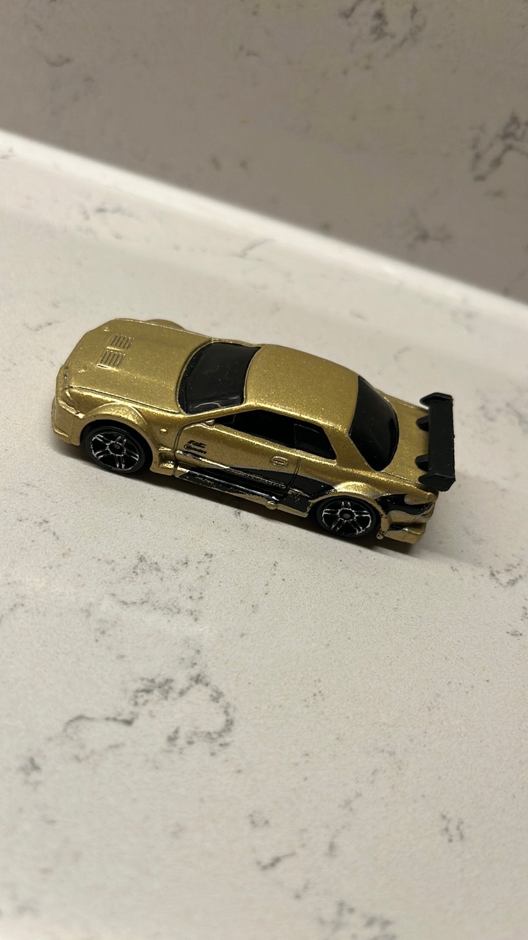 Vintage HOT WHEELS 2001 Nissan Skyline GT-RR32 Gold, Ophalen of Verzenden, Gebruikt