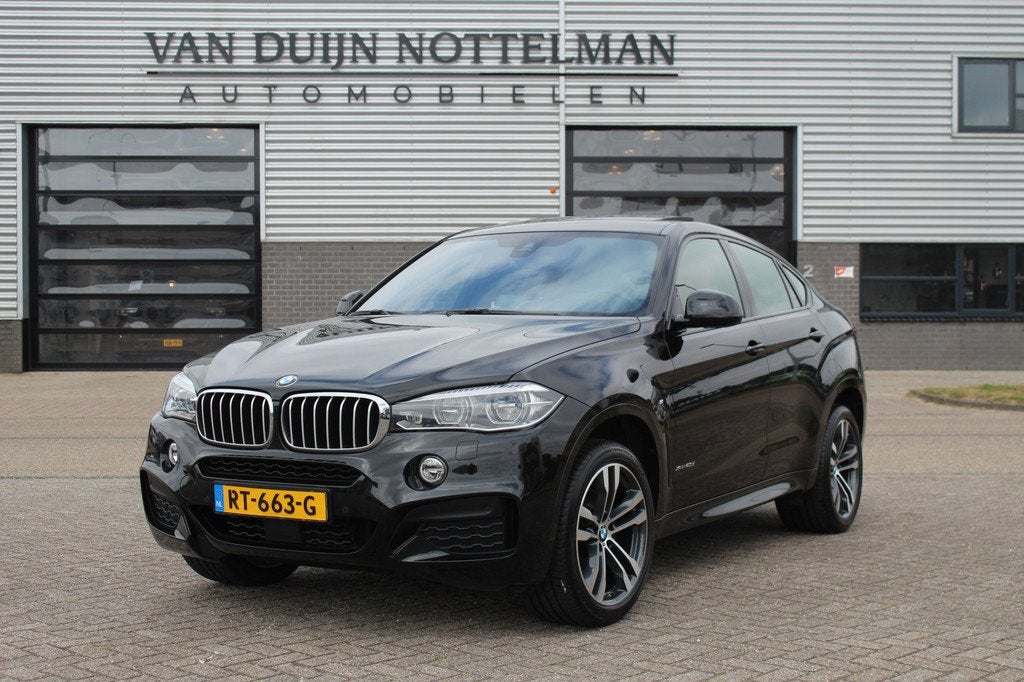 BMW X6 xDrive40d High Executive / M Sport / B&O / Schuifdak, Auto's, BMW, Automaat, Gebruikt, 2993 cc, Met garantie (alle)