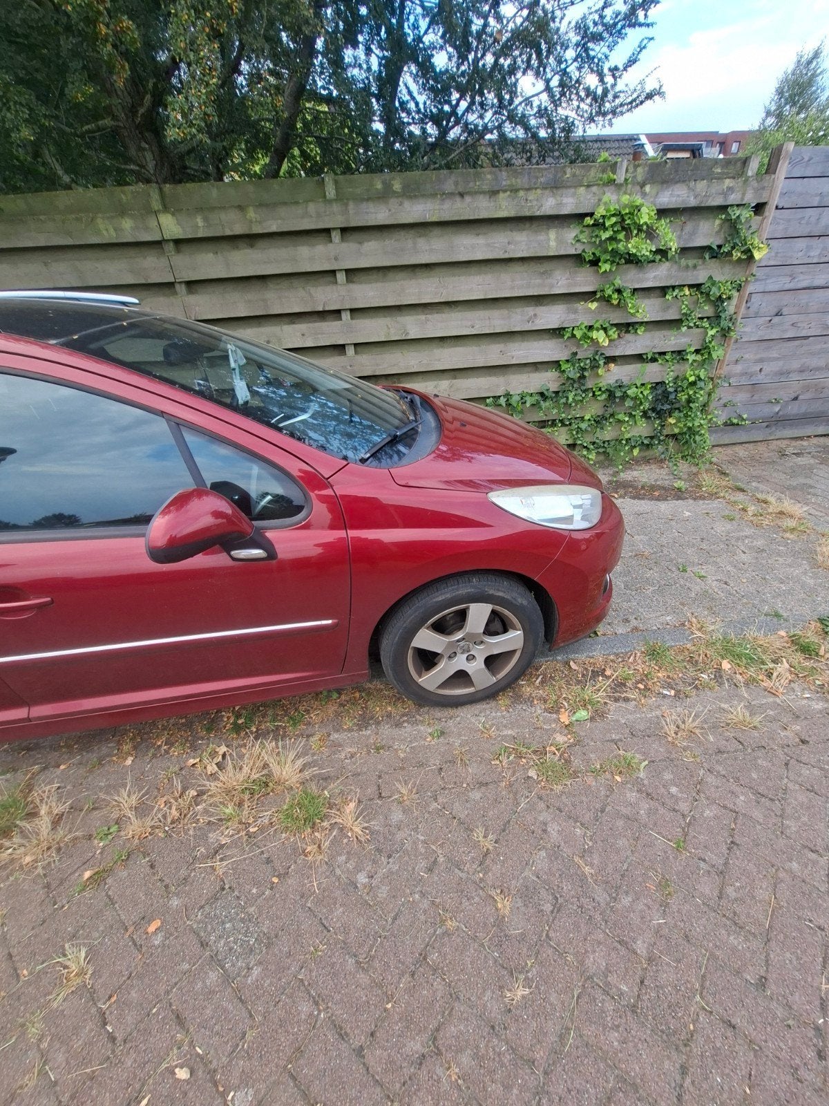 Peugeot 207 1.6 16V SW Outdoor 2010 Rood, Auto's, Voorwielaandrijving, 4 cilinders, Origineel Nederlands, Stationwagon