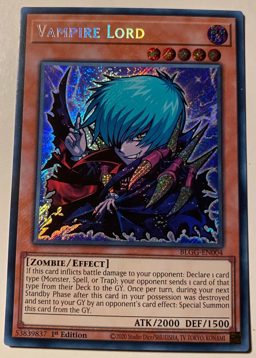 Yu-Gi-Oh! Toon Style Vampire Lord BLGG 1st Foil Bleed 🩸, Ophalen of Verzenden, Zo goed als nieuw, Losse kaart, Foil