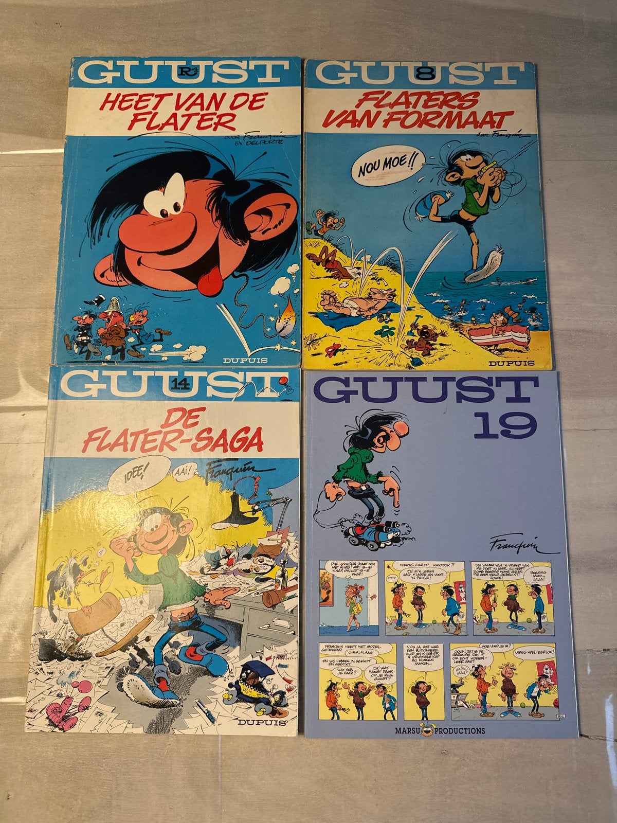 Guust Flater stripboeken - 4 stuks, Meerdere stripboeken, Ophalen of Verzenden, Gelezen
