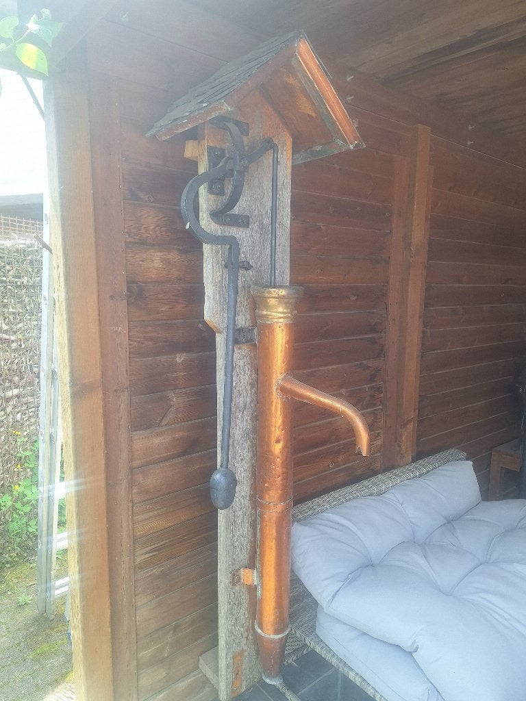 Antieke waterpomp, Ophalen, Koper