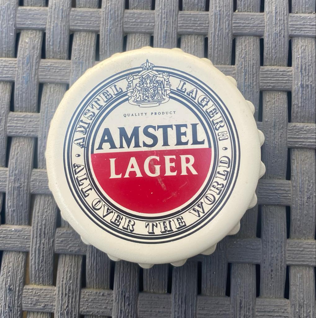 Ronde opener van Amstel Lager. Drsn. 6,5 cm., Ophalen of Verzenden, Zo goed als nieuw, Gebruiksvoorwerp