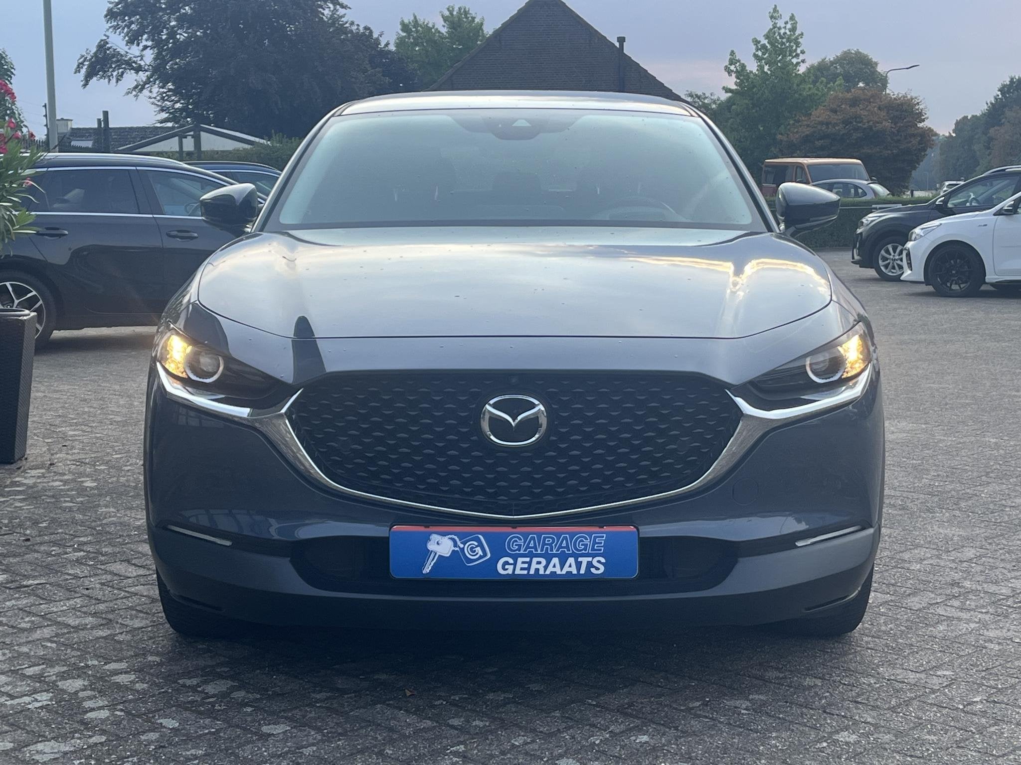 Mazda CX-30 2.0 e-SkyActiv-G M Hybrid Comfort l Automaat, Tr, Auto's, Mazda, Stof, Gebruikt, Euro 6, 4 cilinders