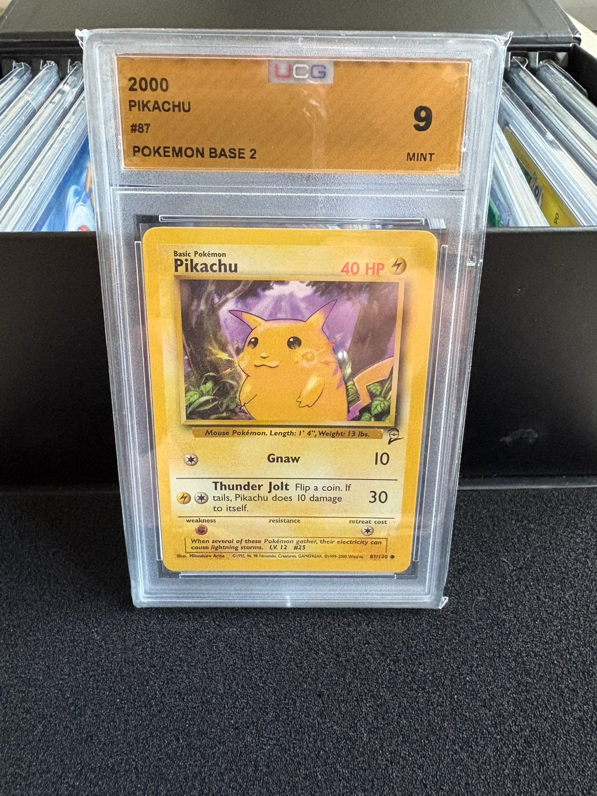 Pikachu base set 2 grade 9, Ophalen of Verzenden, Zo goed als nieuw, Meerdere kaarten, Foil