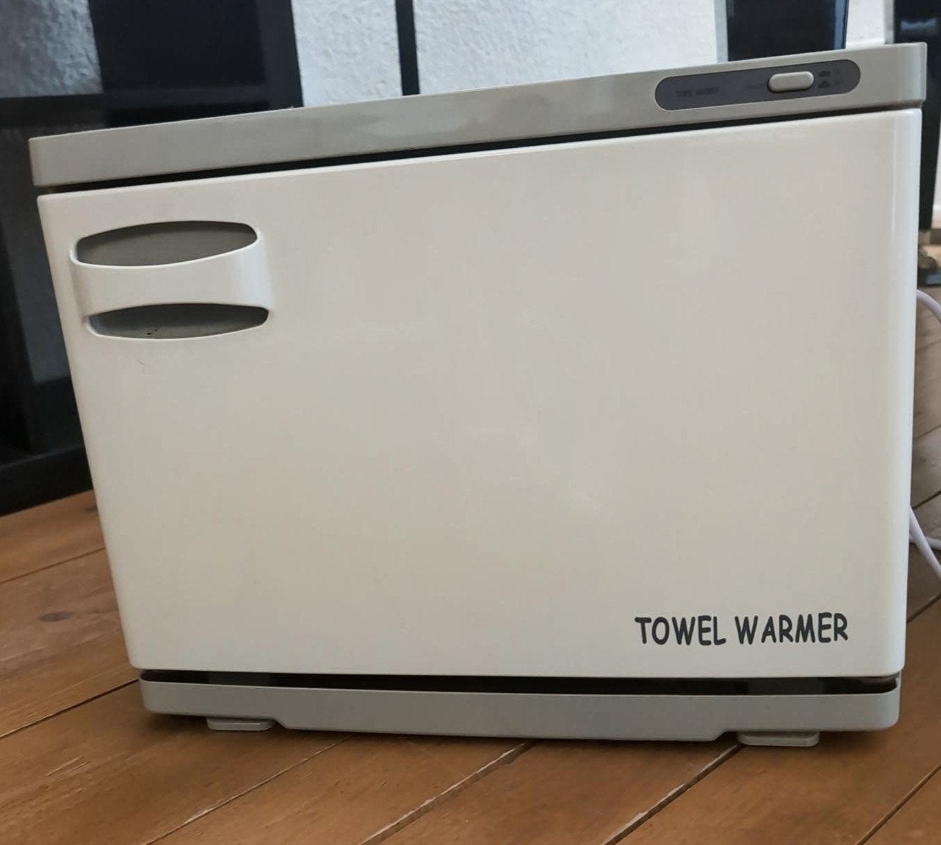 Handdoek- / towelwarmer, Ophalen
