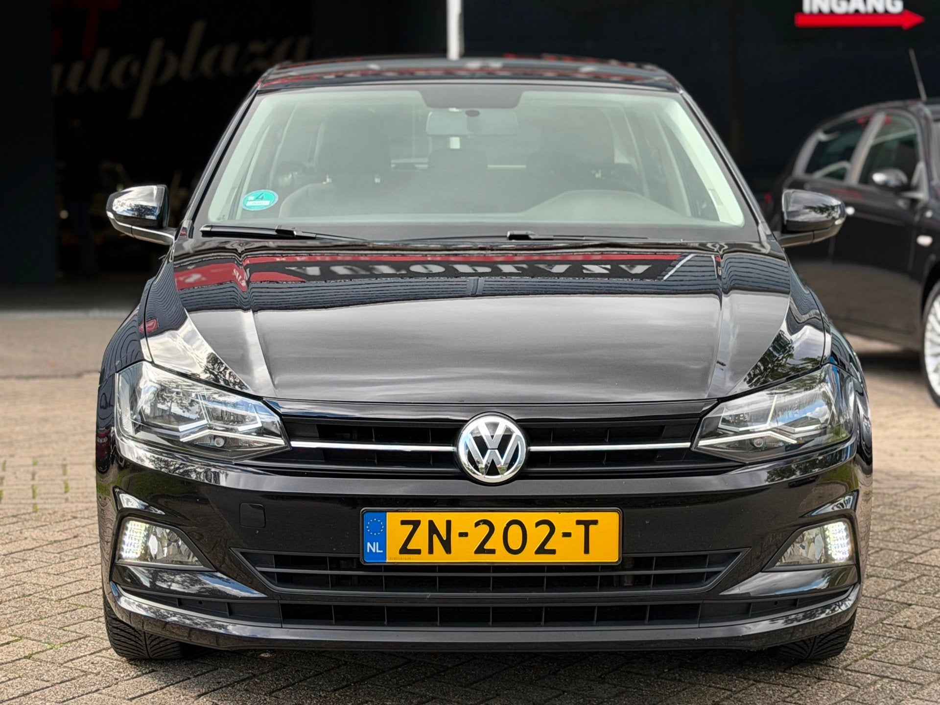 Volkswagen Polo 1.0 TSI Comfortline 5-DEURS CARPLAY/NAVI/CRU, Dealer onderhouden, Stof, Met garantie (alle), Zwart