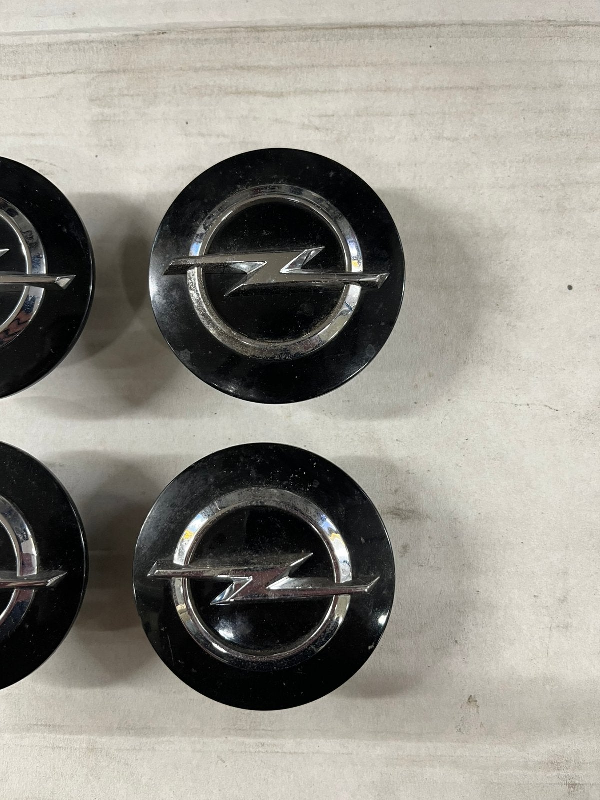 Opel naafkapjes zwart, Ophalen of Verzenden, Opel
