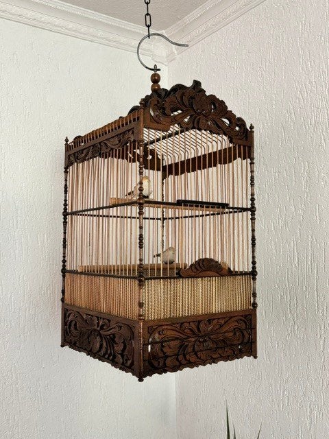 antieke vogelkooi, Ophalen