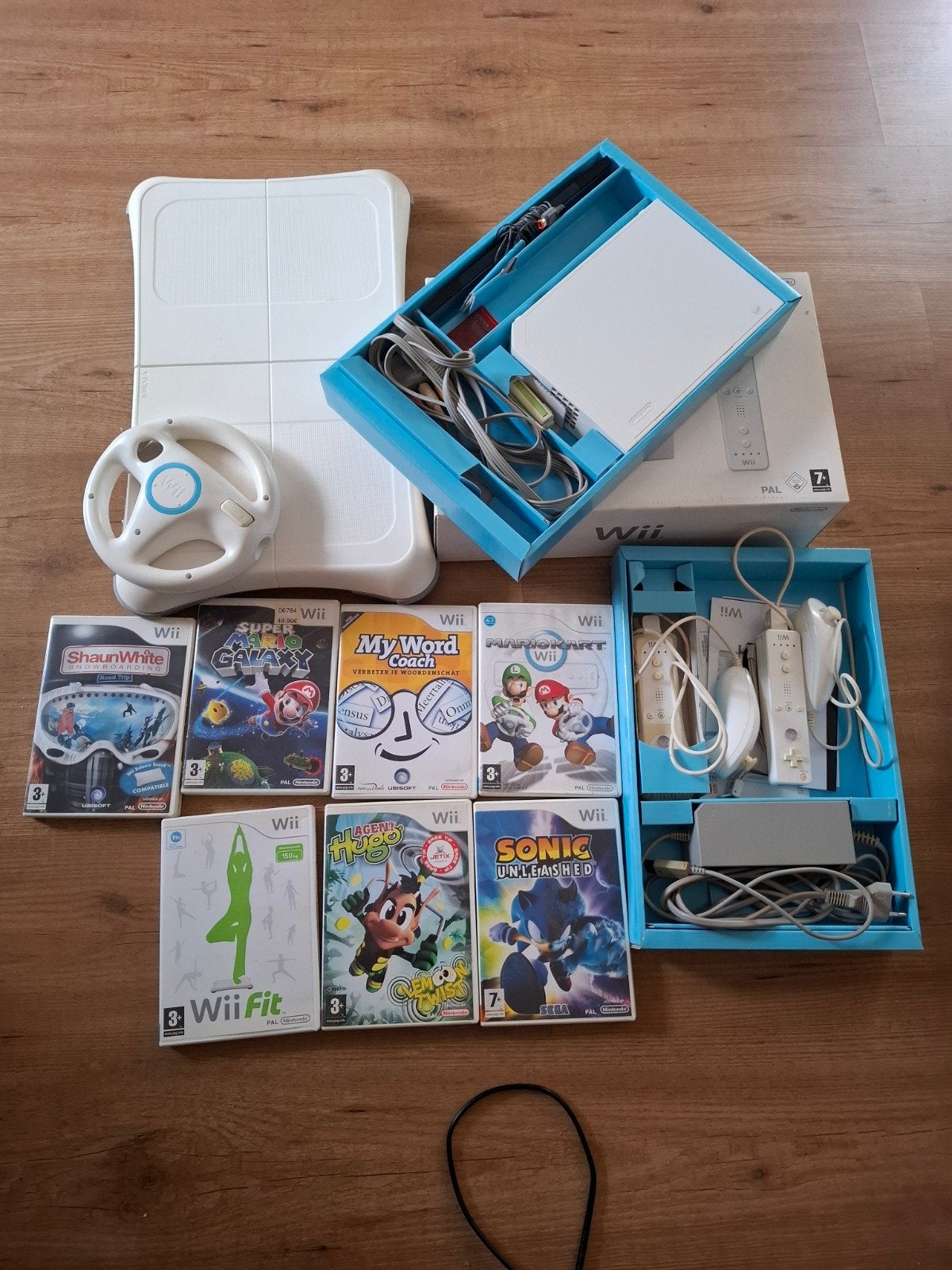 Wii console met Balance Board, stuurtje en 6 games, Ophalen of Verzenden, Gebruikt, Met 2 controllers, Met stuurtje
