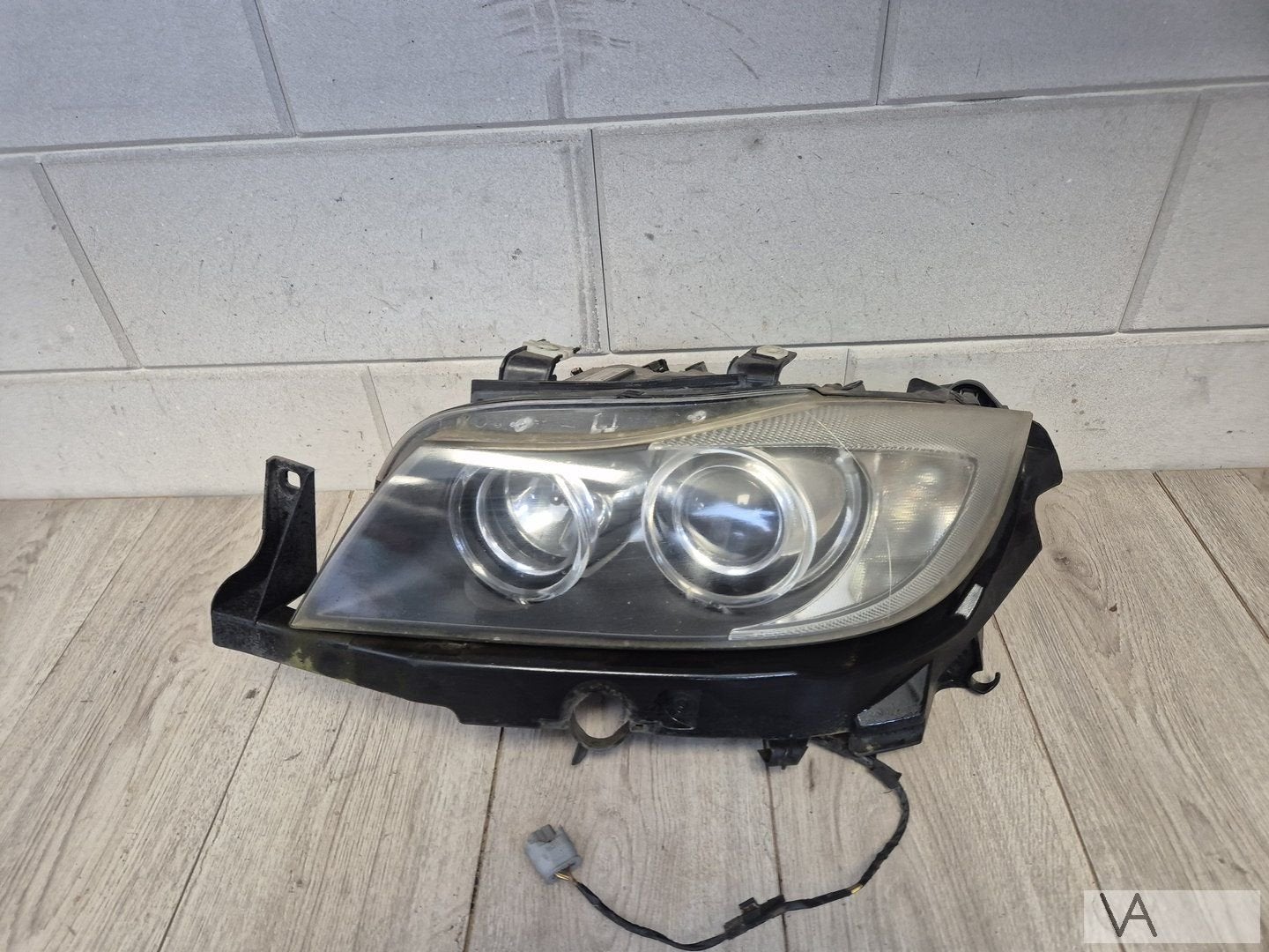 Koplamp links XENON van BMW 3 serie E90 E91 2005 - 2009 €125, Gebruikt, -, -, Ophalen of Verzenden
