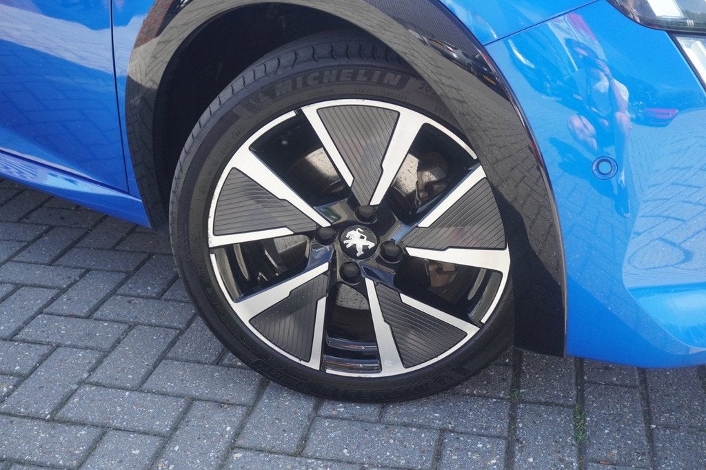 Peugeot E-208 EV GT 350 50 kWh SOH 87,8 / Carplay / 360 Came, Auto's, Peugeot, 136 pk, Gebruikt, Zwart, Blauw