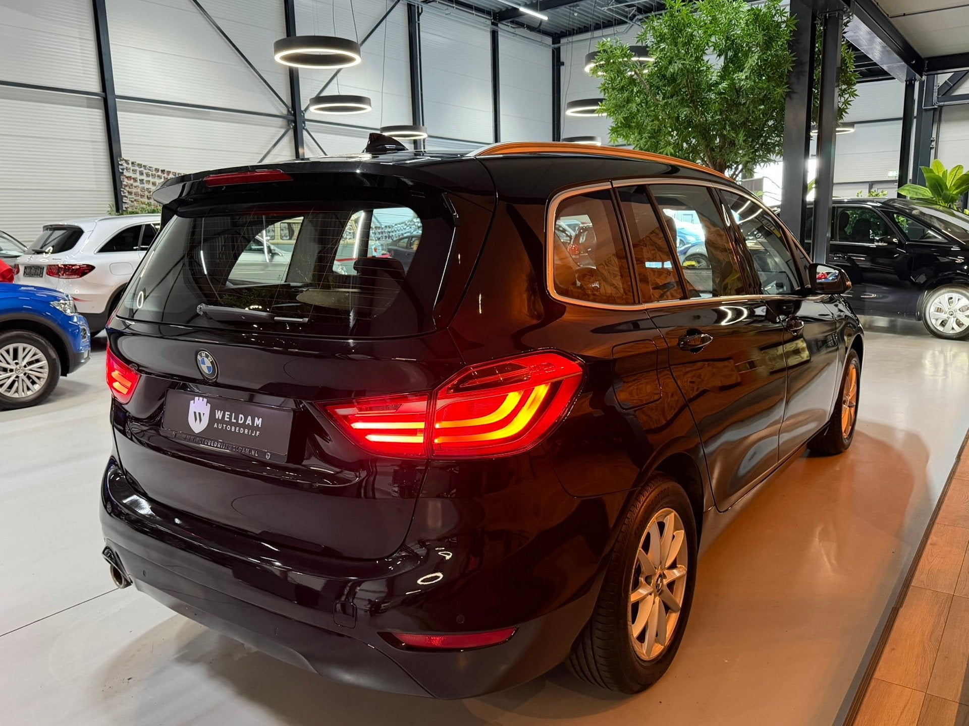 BMW 2-serie Gran Tourer 218i Luxe Uitvoering|Elektrisch Acht, Auto's, Dealer onderhouden, Stof, Zwart, Bedrijf