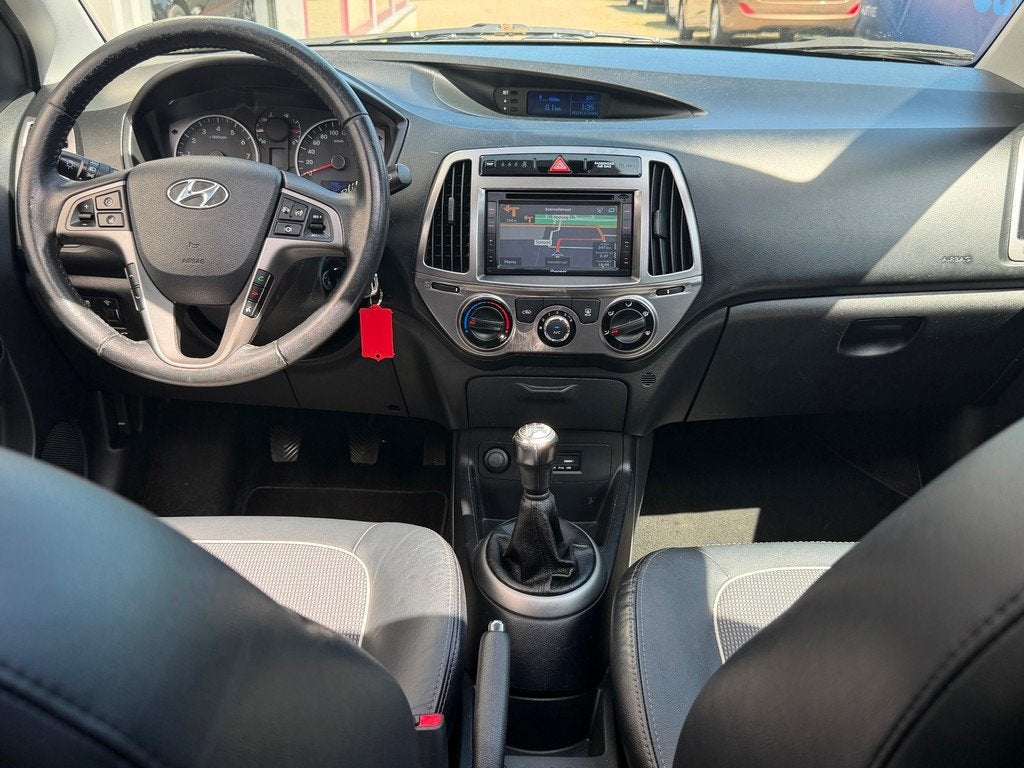 Hyundai I20 1.2i Go! Plus |1e Eigenaar|Pano|Navi|Airco|Cruis, Euro 5, Gebruikt, 4 cilinders, Leder en Stof
