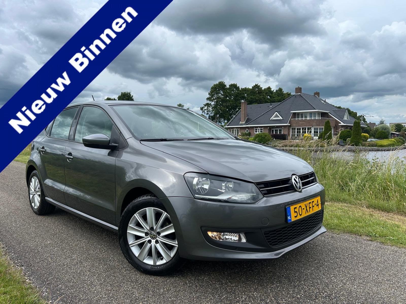 Volkswagen Polo 1.2 TSI BlueMotion Comfort Edition | Cruise, Voorwielaandrijving, Euro 5, Stof, Zwart