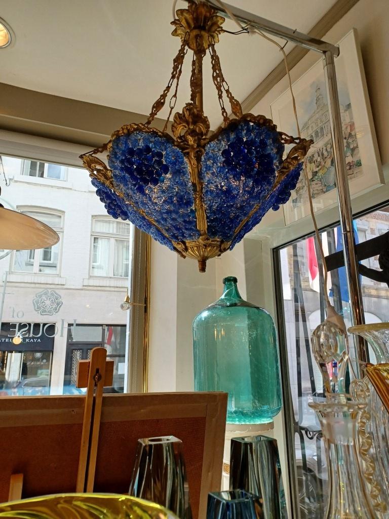Antieke hanglamp blauw glas met messing, Ophalen